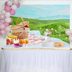 Lofaris Charming Picnic Photography Backdrop with Wicker Basket and Fruits Lush Green Hills Studio Outdoor Photoshoot