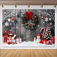 Lofaris Snowy Wooden Christmas Backdrop with Festive Wreath and Snowman Winter Wonderland Background for Holiday Photoshoot and Party Decor