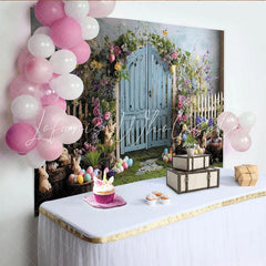 Lofaris Whimsical Spring Garden Easter Backdrop with Blue Wooden Door White Picket Fence and Colorful Flowers Green Grass