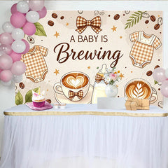 Lofaris A Baby Is Brewing Coffee Baby Shower Backdrop with Onesies and Latte Art Warm Brown Background for Gender Reveal Party