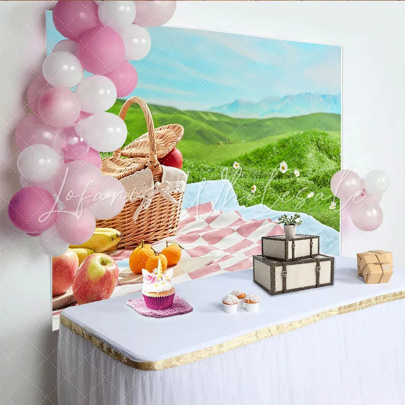 Lofaris Charming Picnic Photography Backdrop with Wicker Basket and Fruits Lush Green Hills Studio Outdoor Photoshoot
