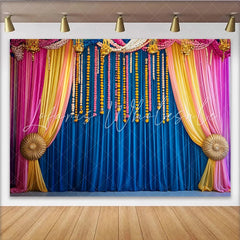 Lofaris Marigold Floral Stage Backdrop Blue Curtains and Vibrant Hanging Flower Strings Event Banner